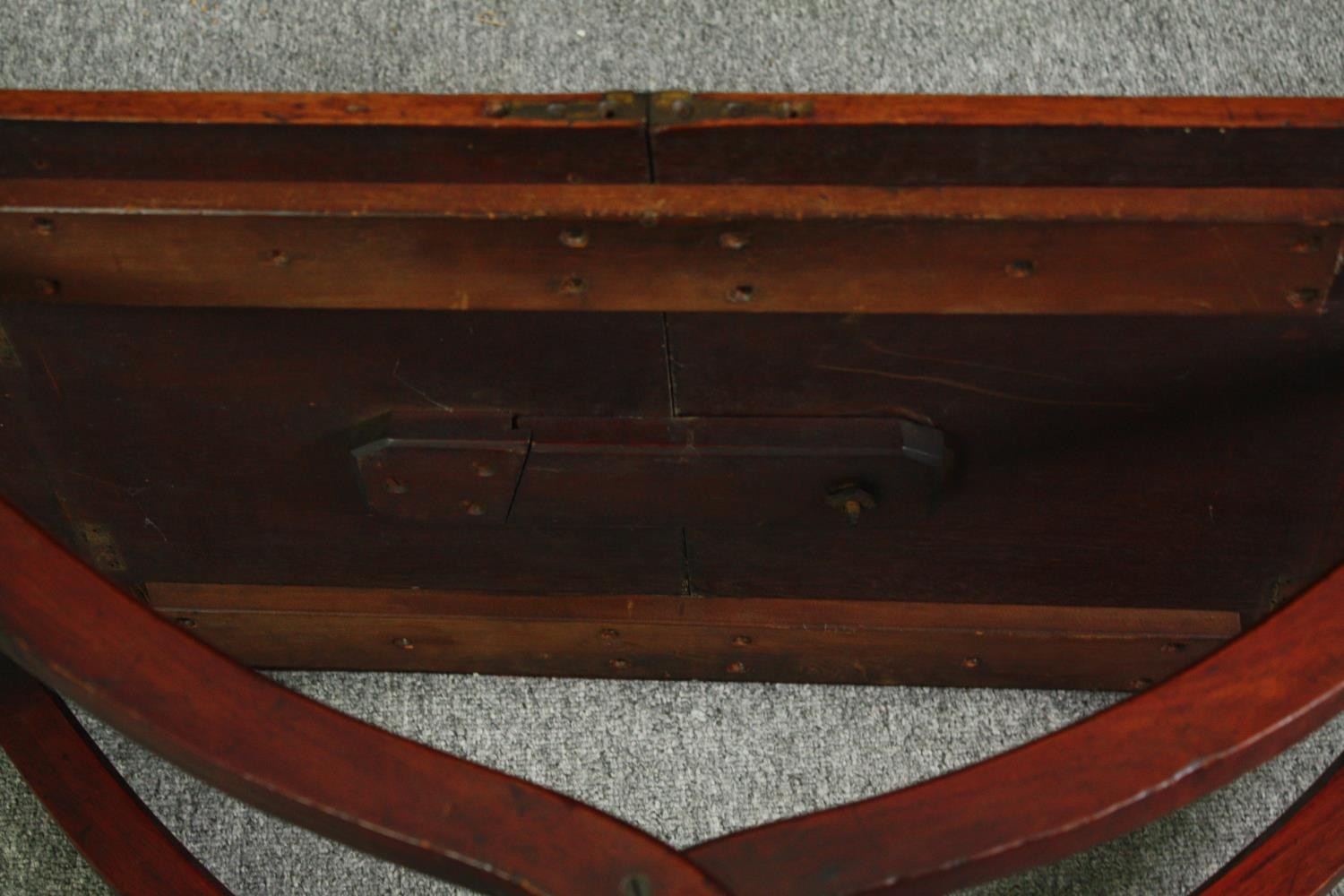 A 19th century mahogany folding campaign table, later adapted to a fixed top. H.59 W.91 W.45cm. - Image 7 of 7