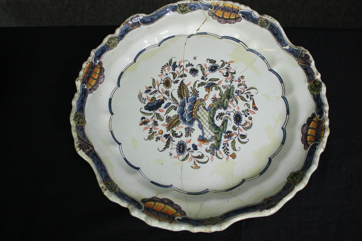 A collection of 19th century faience plates. One damaged. Dia.34cm. (largest). - Image 6 of 11