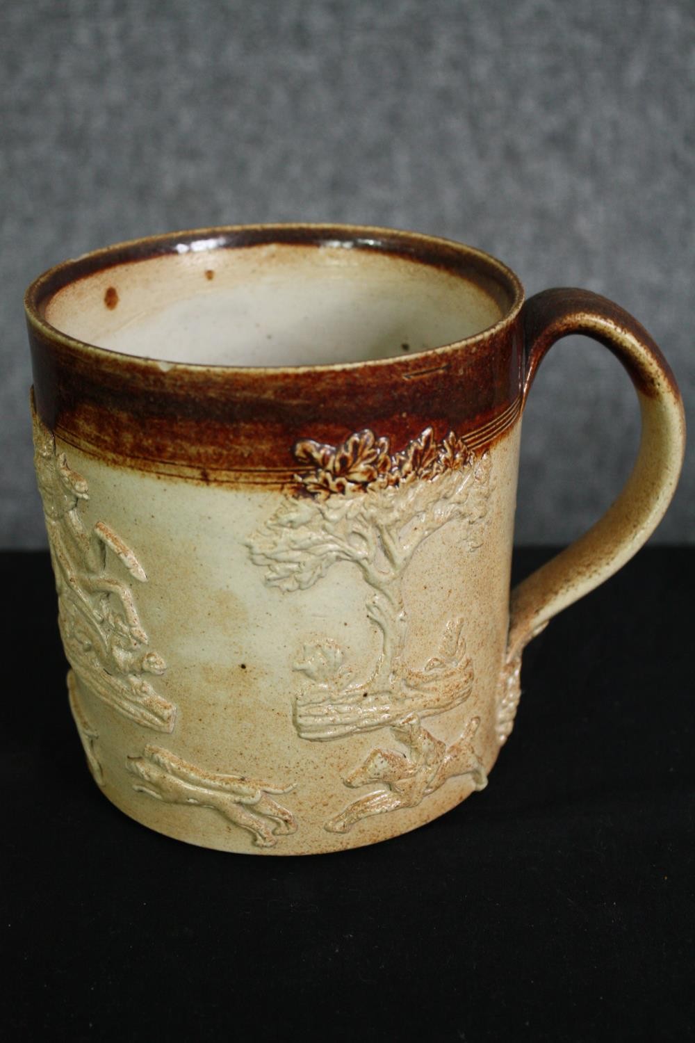 Two 19th century two tone stoneware harvest/hunting mugs of large proportions with moulded sprig - Image 2 of 7