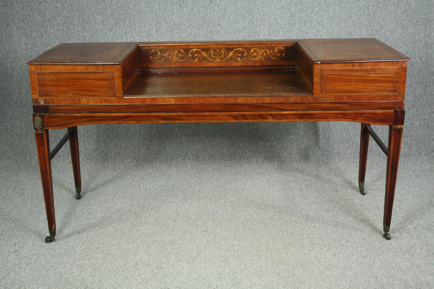 A Georgian mahogany and inlaid writing table, converted from a spinet. H.85 W.160 D.58cm.