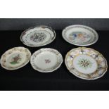 A collection of 19th century faience plates. One damaged. Dia.34cm. (largest).