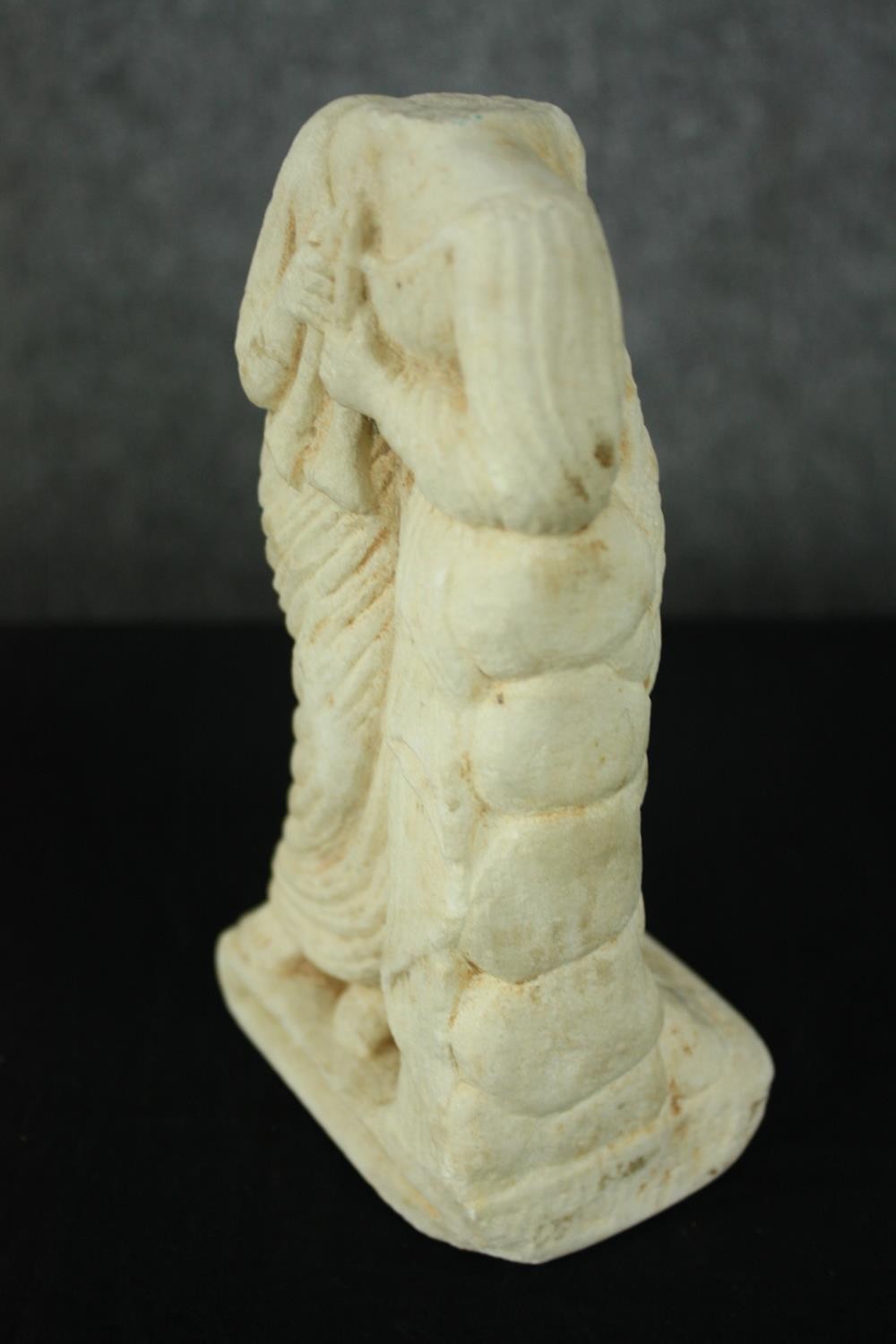 A ceramic dancing Geisha and a carved stone figure. H.31cm. (largest) - Image 6 of 9