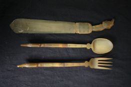 Cutlery set, carved horn inlaid with iron studded detail. L.40cm. (largest).
