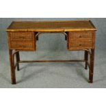 A vintage cane and bamboo writing or dressing table. H.75 W.107 D.44cm.