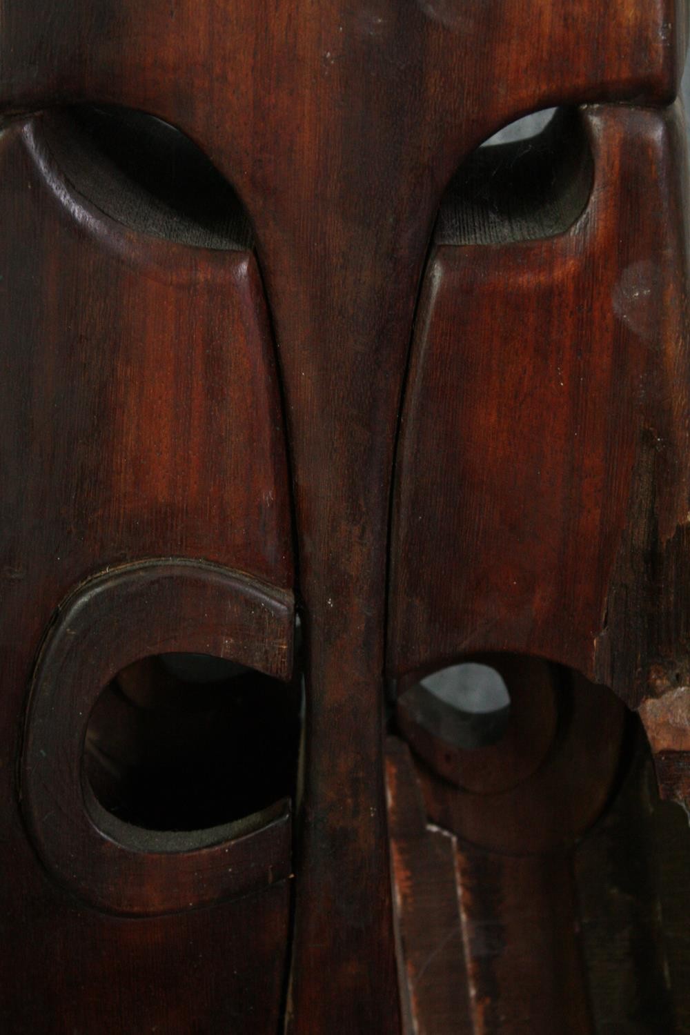 A carved hardwood abstract figure group. H.54 W.80 D.21cm. - Image 7 of 7