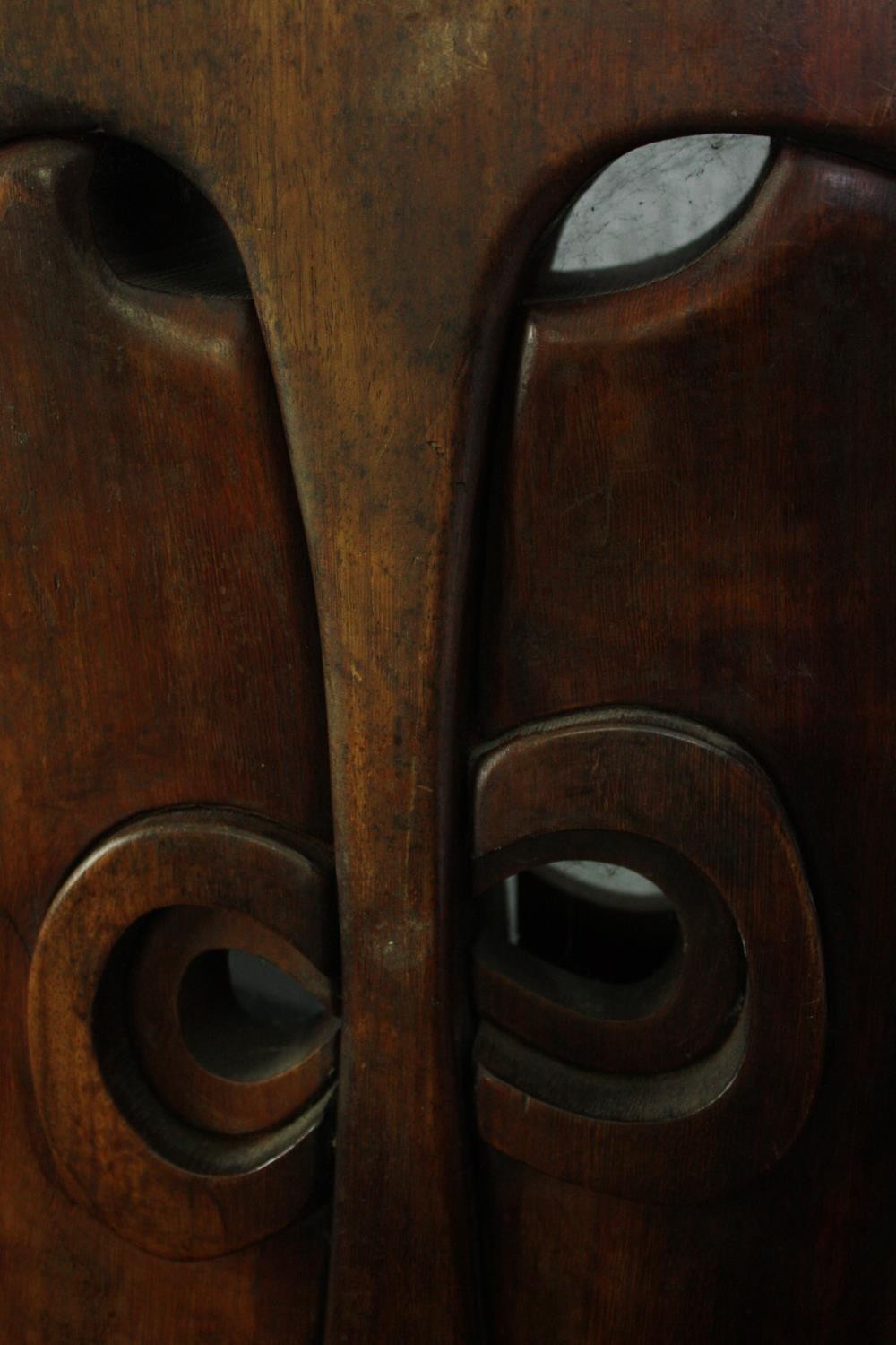 A carved hardwood abstract figure group. H.54 W.80 D.21cm. - Image 5 of 7