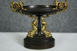 A French Napoleon III bronze classical design tazza with gilded Roman dolphins. H.17cm.