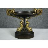 A French Napoleon III bronze classical design tazza with gilded Roman dolphins. H.17cm.