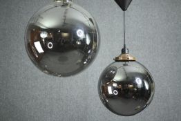 Two contemporary hanging glass pendant ceiling light fittings. Dia.35cm. (largest)