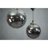 Two contemporary hanging glass pendant ceiling light fittings. Dia.35cm. (largest)