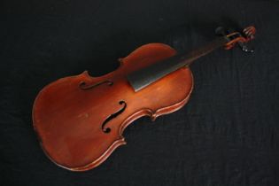 An old violin (comes with no strings attached). L.56cm.