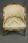 A 19th century French Louis XV style carved and gilded fauteuil armchair. H.67cm.