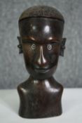 A carved African hardwood bust. H.21cm. (largest).