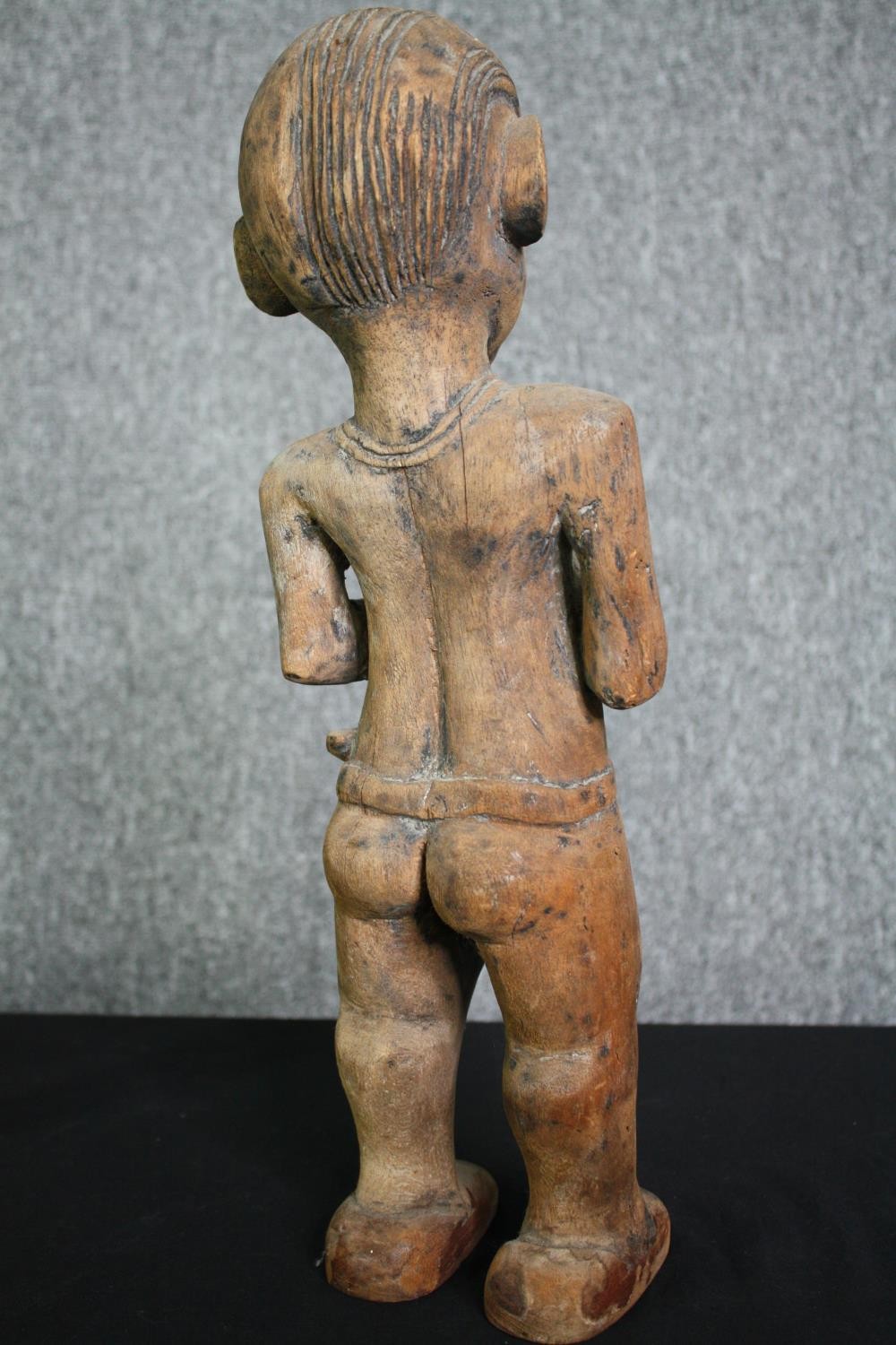 A carved Eastern hardwood figure of a goddess, an African carving and a central American carved - Image 6 of 15