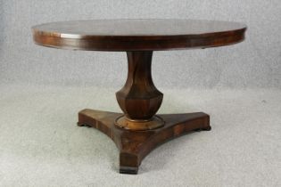Dining table, William IV rosewood with brass inlay. H.70 Dia.121cm.