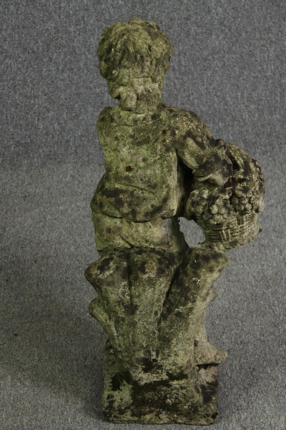 A composite garden statue of a young boy. H.77cm. - Image 4 of 4