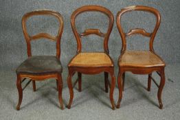 A pair of 19th century French walnut bedroom chairs and a similar chair.