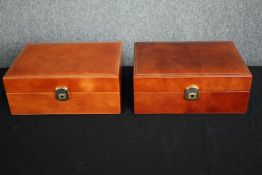 A pair of leather fitted stationery cases. H.13 W.32 D.23cm. (each).