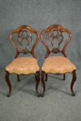 Dining or side chairs, Victorian carved walnut.