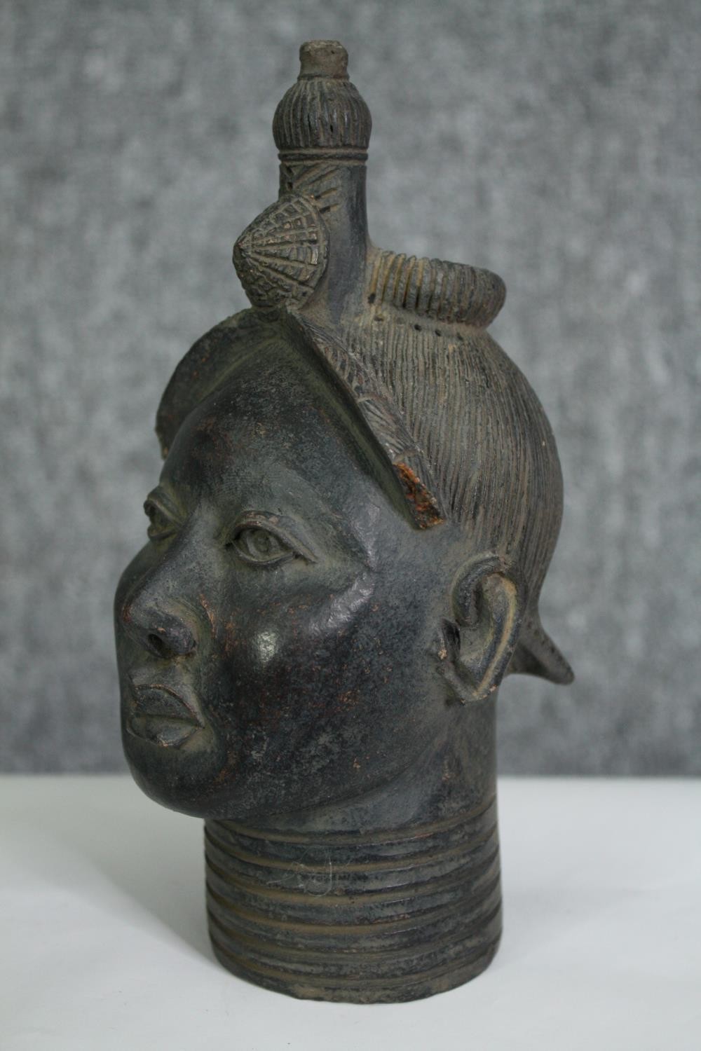 A Benin bronze style bust of a woman. H.22cm. - Image 2 of 4