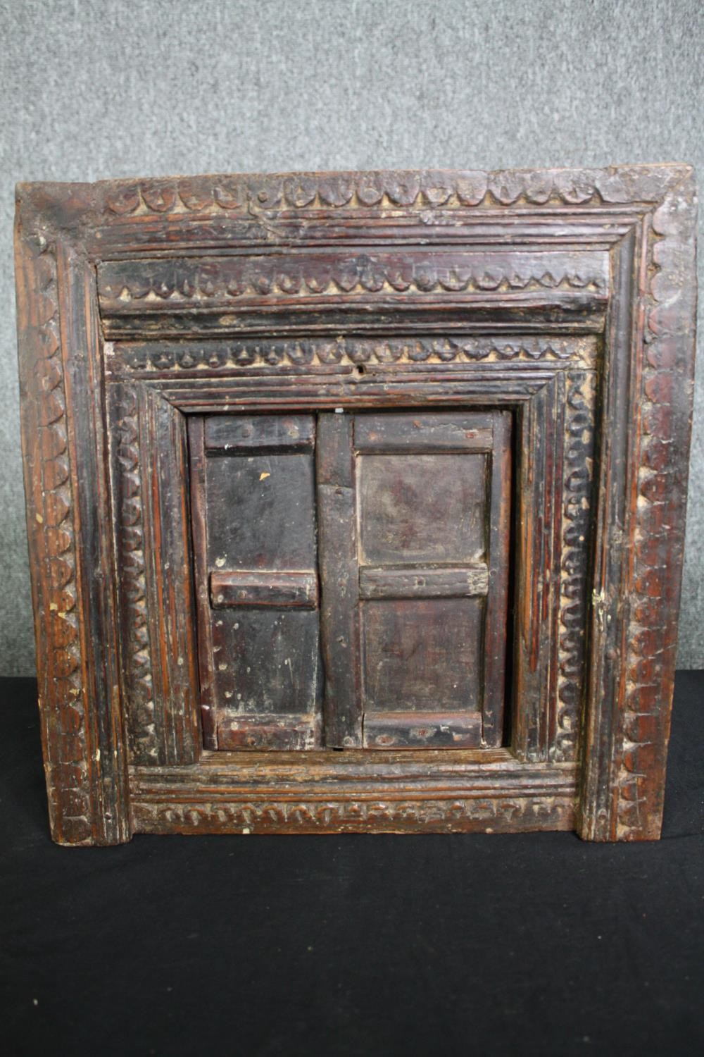 A collection of Eastern brassware and a carved hardwood framed with hinged door. H.40 W.38cm. ( - Image 7 of 8