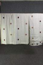 A pair of fully lined white abstract block pattern cotton mix curtains. L.230 W.225cm. (each).