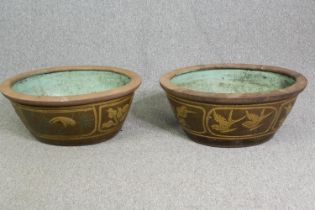 A pair of Chinese earthenware garden planters. H.30 W.70 D.60cm. (each).