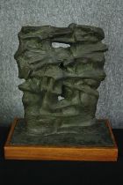 A mid century cast metal abstract figure group on plinth base. H.41cm.