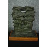 A mid century cast metal abstract figure group on plinth base. H.41cm.