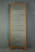 A full height wall cabinet with drop down drawers. H.170 W.52 D.15cm. (One handle needs a repair).