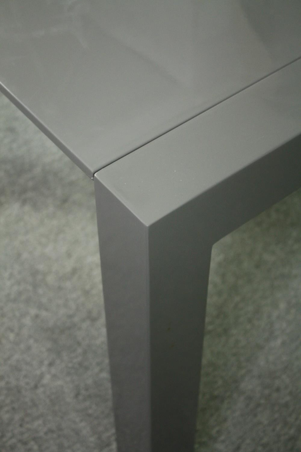 A contemporary extending dining table with integral leaf. H.76 W.170 (ext) D.103cm. - Image 5 of 10