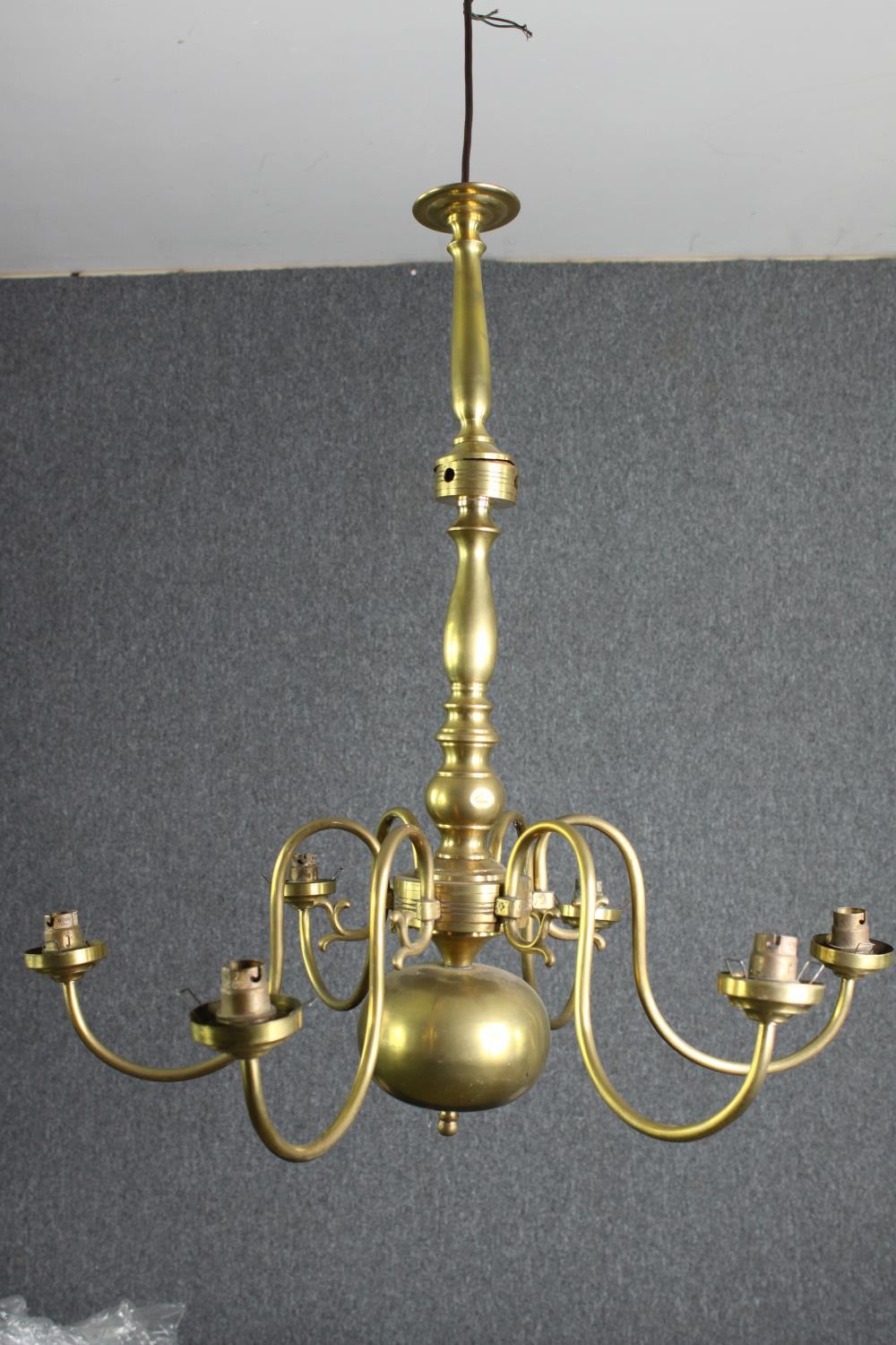 A Dutch style brass six branch chandelier. H.57 Dia.60cm.