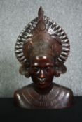 A mid century carved hardwood bust of a Balinese tribal woman. H.36cm.