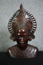 A mid century carved hardwood bust of a Balinese tribal woman. H.36cm.