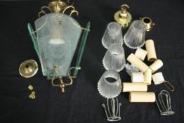 A glass hanging lamp along with glass shades etc. H.30cm. (largest).