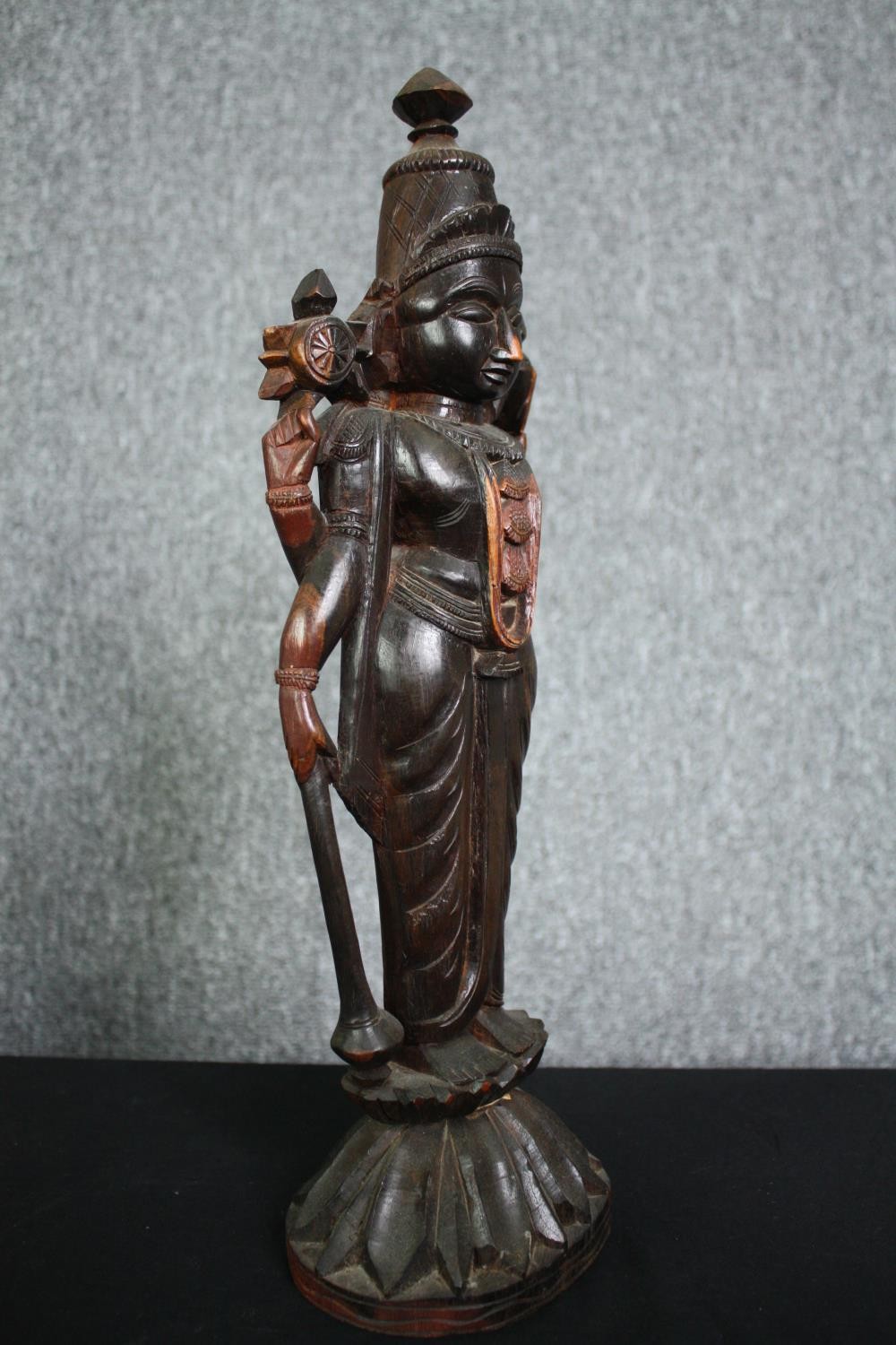 A carved Eastern hardwood figure of a goddess, an African carving and a central American carved - Image 13 of 15
