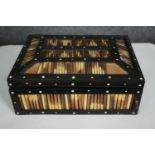 An early 20th century Anglo Ceylonese ebony and bone inlaid porcupine quill box containing a