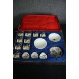 A cased part set of Japanese 19th century egg shell porcelain, including nine coffee cups with