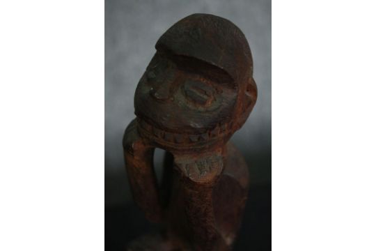 A carved Eastern hardwood figure of a goddess, an African carving and a central American carved - Image 11 of 15