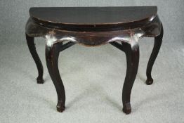 A substantial Chinese lacquered hardwood console table, possibly 19th century. H.84 W.120 D.59cm.