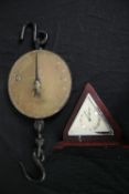 19th century brass hanging scales and an Art Deco mantel clock. L.60cm. (largest)