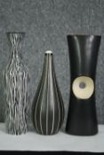 A vintage Midwinter art vase along with two other similar vases. H.26cm. (largest).