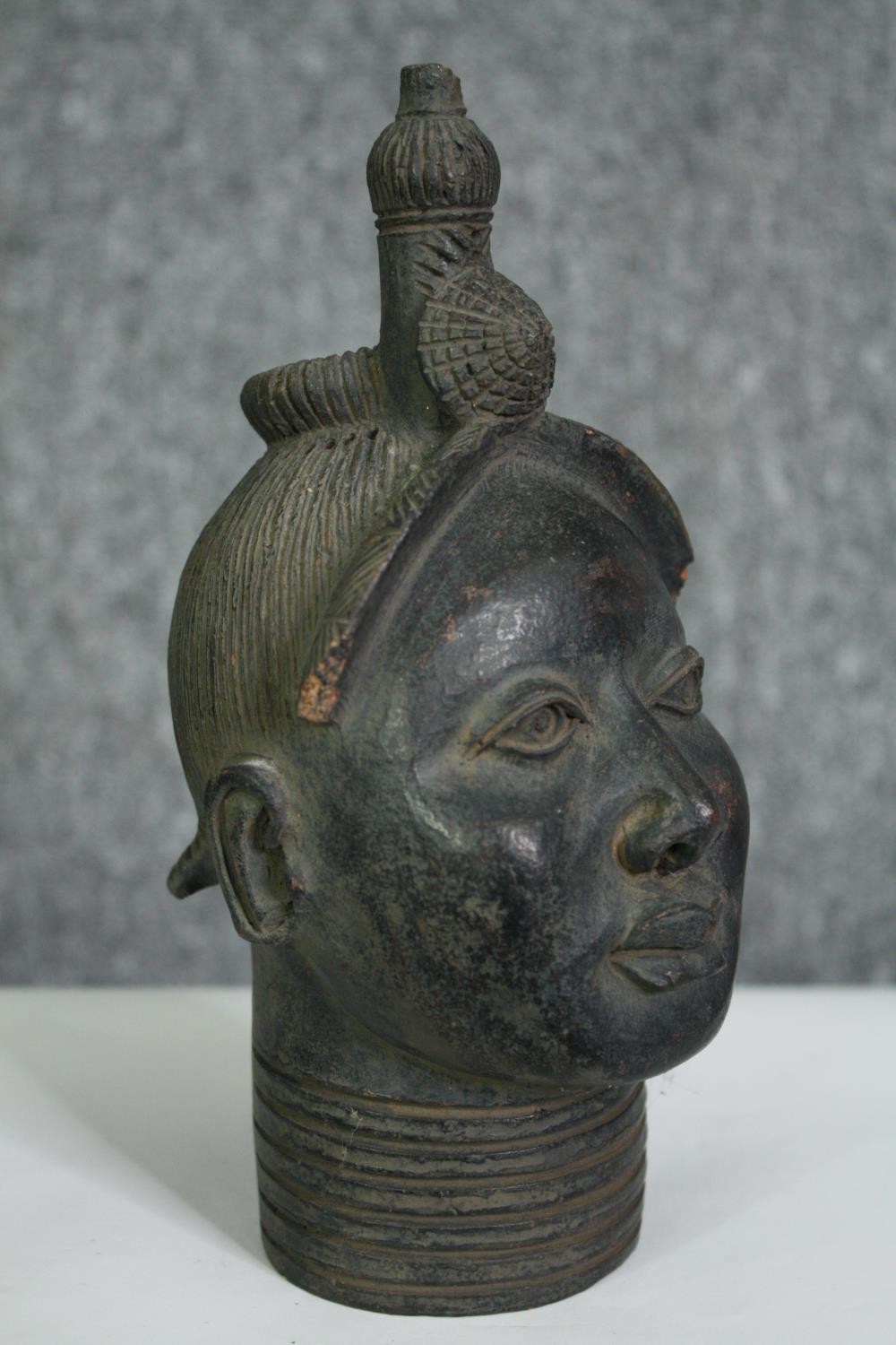 A Benin bronze style bust of a woman. H.22cm. - Image 3 of 4