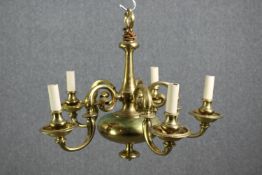 A Dutch style brass five branch chandelier. H.44 Dia.65cm.