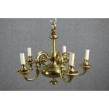 A Dutch style brass five branch chandelier. H.44 Dia.65cm.