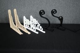 A collection of antique and later shelf brackets. H.31 W.26cm. (largest).
