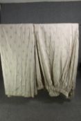 A pair of beige silk mix fully lined curtains with Indian motif. L.230 W.300cm. (each).