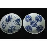 Two 19th century Chinese blue and white hand painted porcelain plates, one with five dragons in