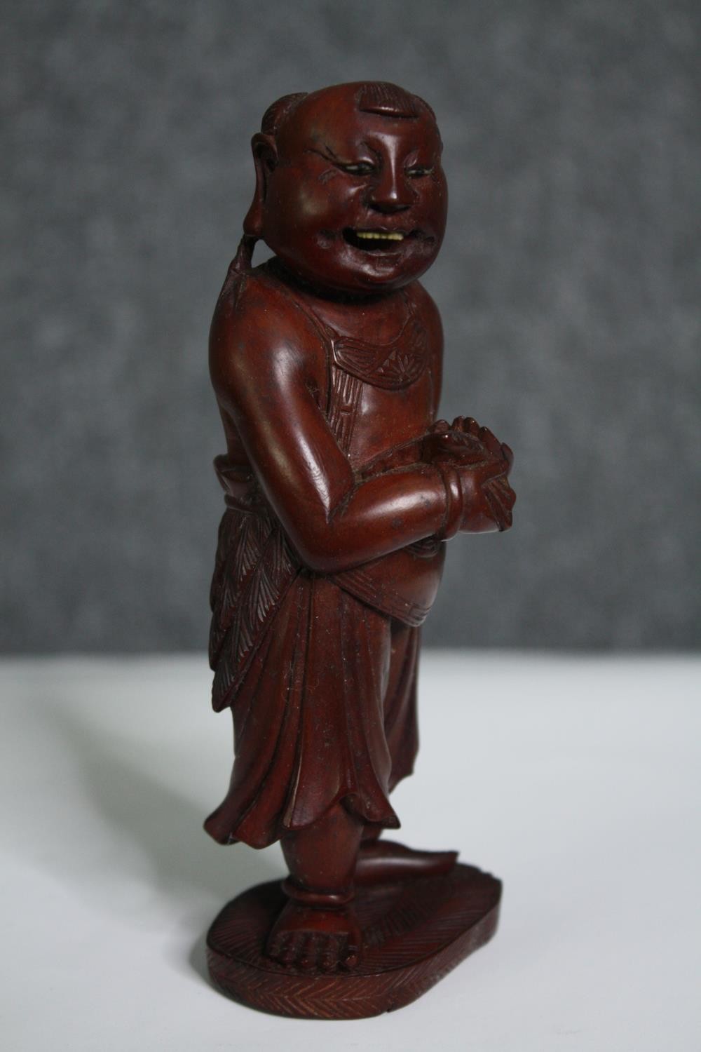 Two Eastern figures, one ceramic the other carved hardwood. H.15cm. (largest). - Image 7 of 10