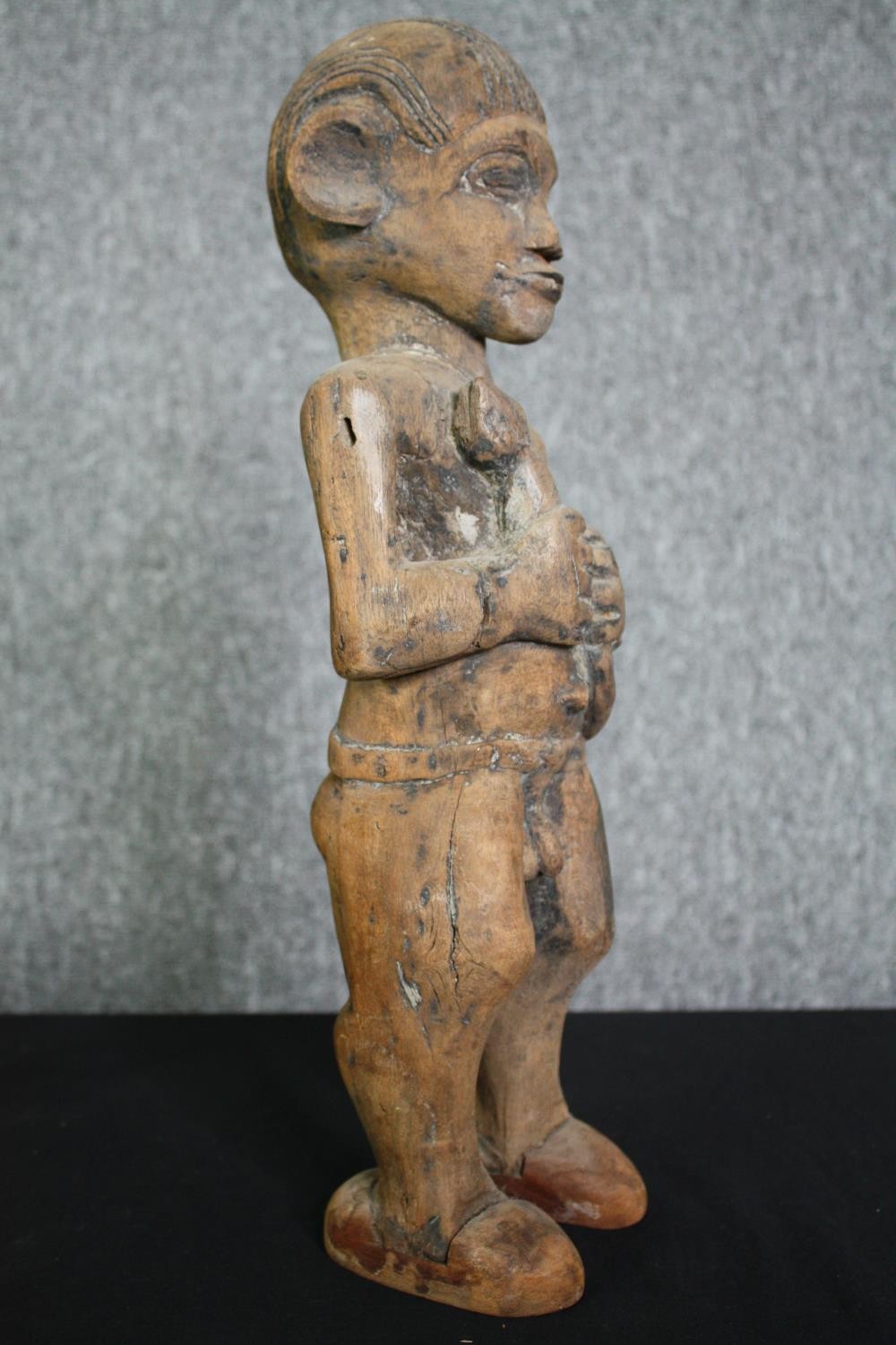 A carved Eastern hardwood figure of a goddess, an African carving and a central American carved - Image 5 of 15